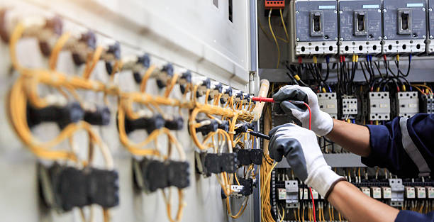 Professional Electrician technician working in Ocean Acres, NJ